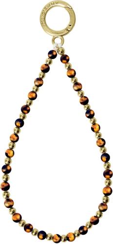 Ein Armband aus goldenen und braunen Perlen mit einem goldfarbenen Verschluss
